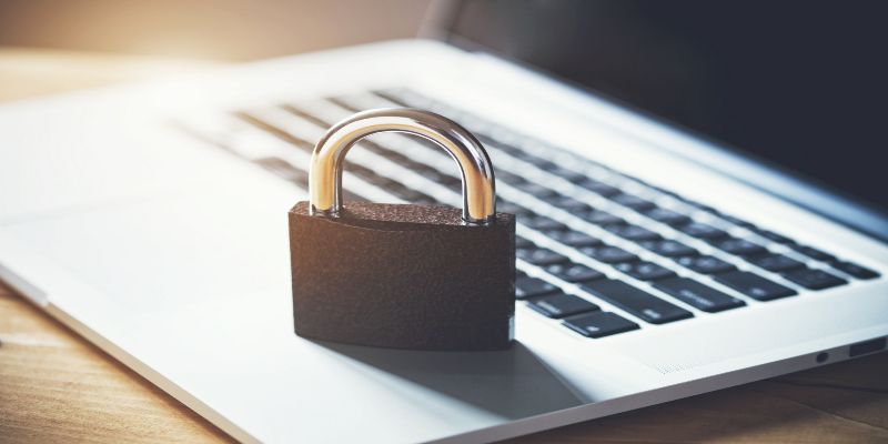 Padlock on a laptop keyboard